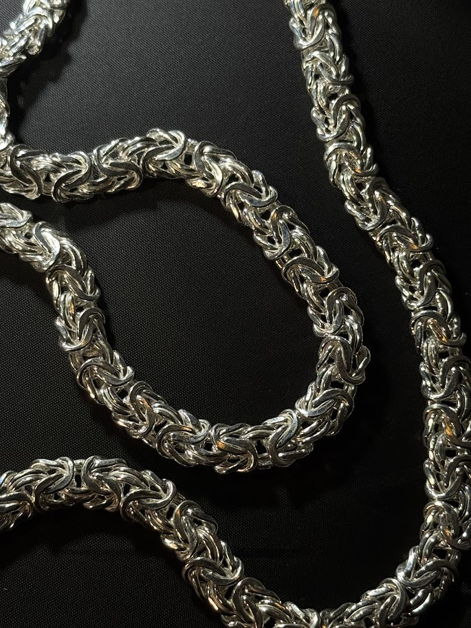 Discover the Byzantine Chain from Lukali & Co — a handcrafted sterling silver design with intricate woven links. Bold, timeless, and built for strength and style.