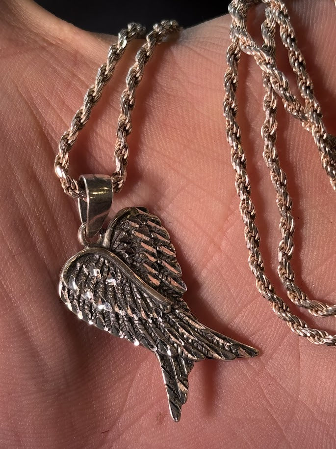 "Fallen Grace" – Blackened Silver Angel Wing Pendant