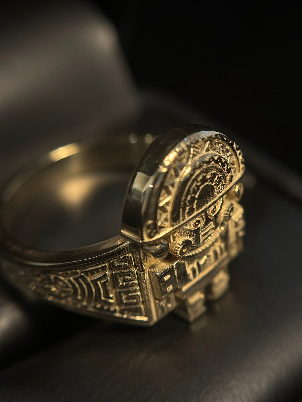 Tumi Totem Ring in gold with carved geometric patterns
