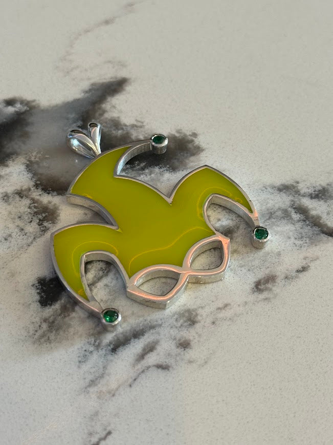 Jester hat pendant in yellow enamel with green stones