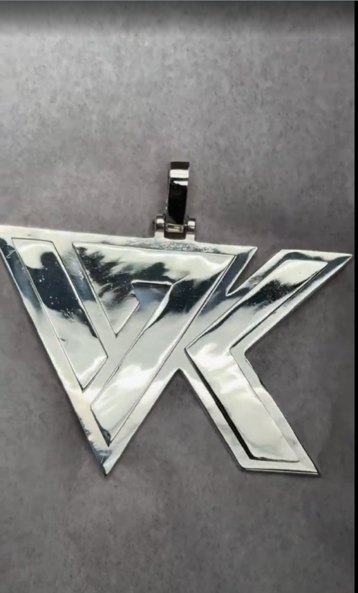 17K Manufacturing logo pendant in polished sterling silver